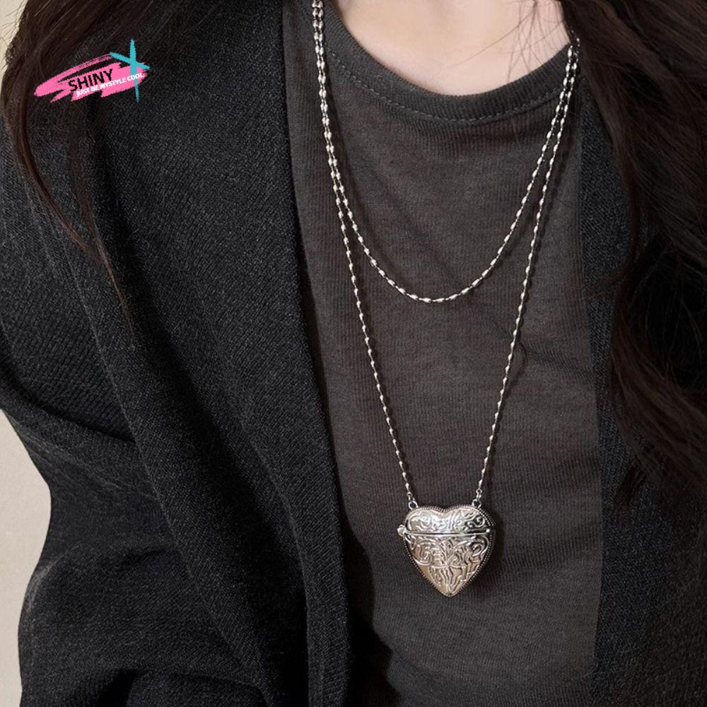 Collar con medallón de corazón - Luxury Bags Photos reseña y precio